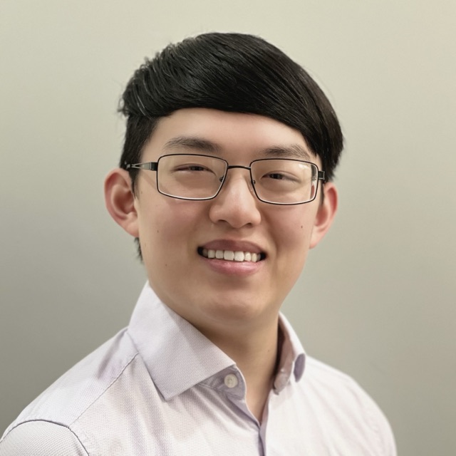 Mingle Li, founder of Mingle Tech Solutions, smiling in a collared shirt