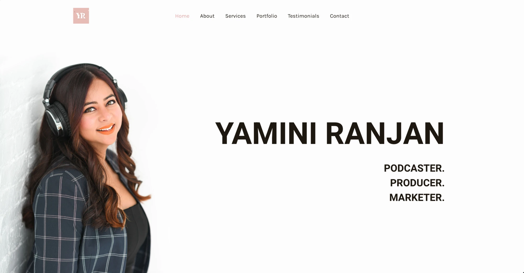 The Yamini Ranjan home page: a portrait of Yamini wearing headphones beside her name and the words "Podcaster. Producer. Marketer."